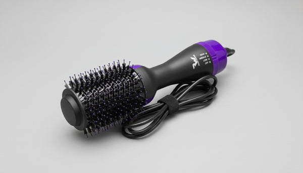 Hair styling tool with black bristle brush head and purple handle on a gray background