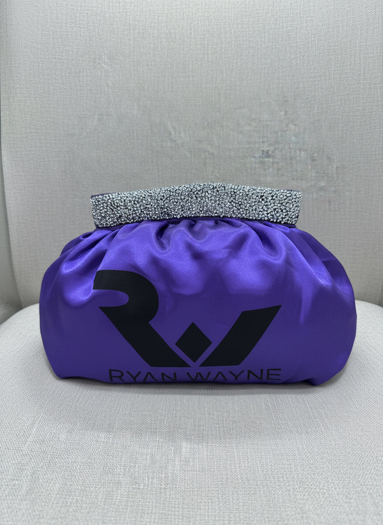 Purple satin headband with 'Ryan Wayne' branding on a gray background
