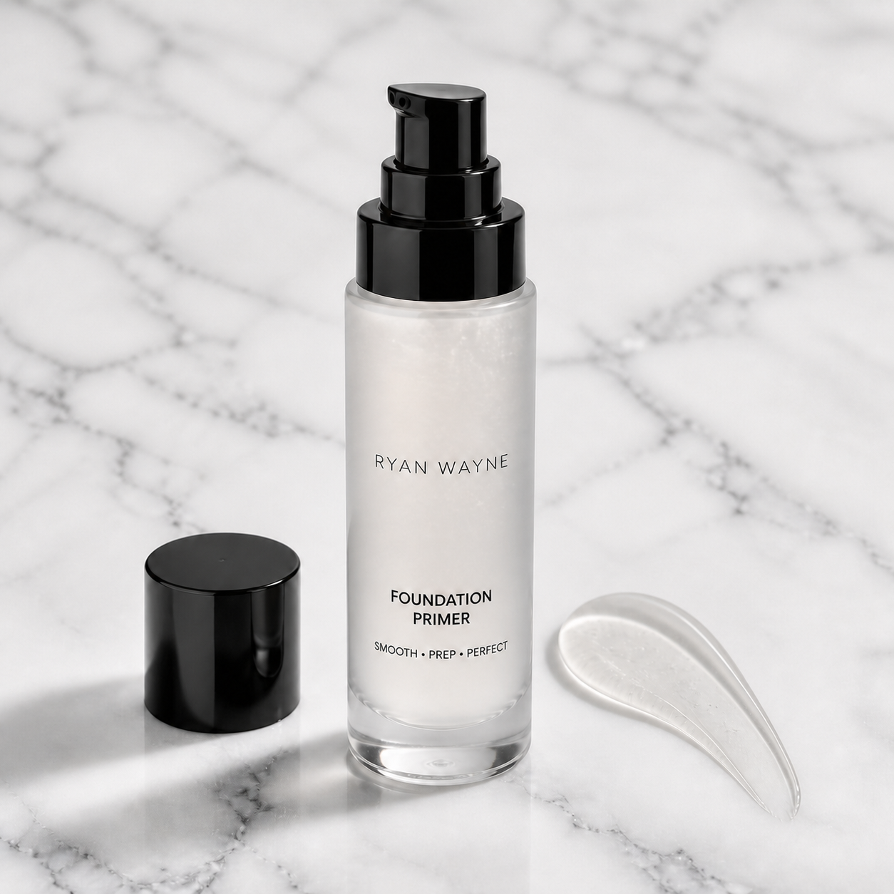 Ryan Wayne Foundation Primer bottle with Ryan Wayne wordmark on white marble