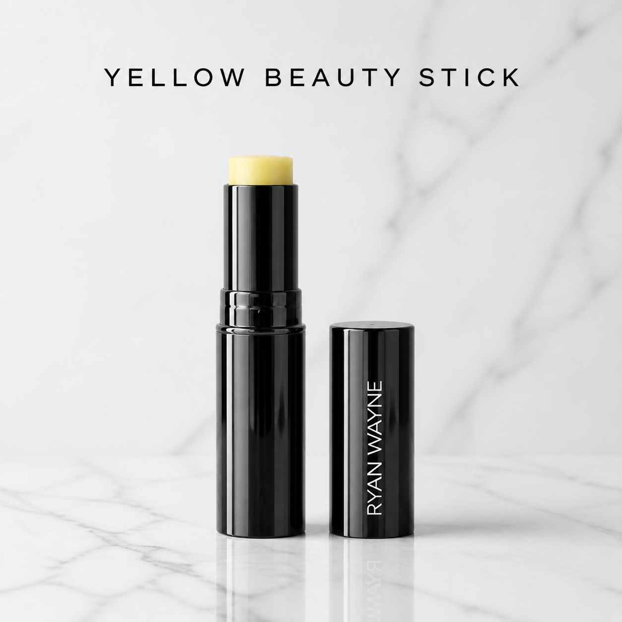 Ryan Wayne Yellow Color-Correcting Beauty Stick on white marble