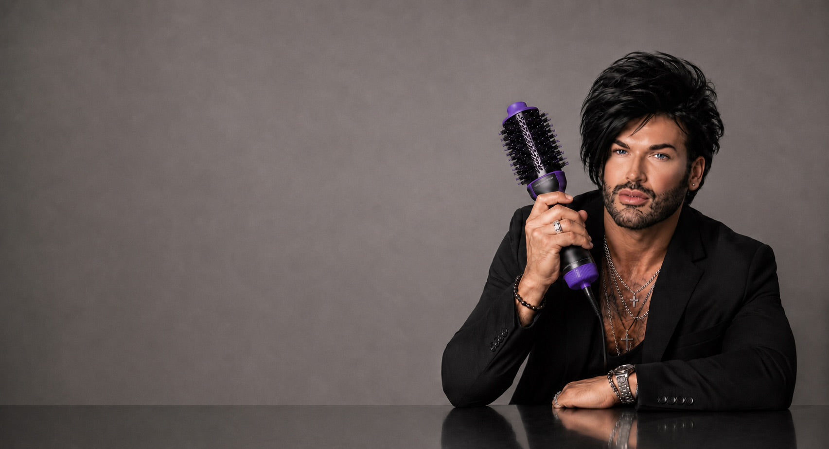 Ryan Wayne styling editorial with visible purple ceramic flat iron