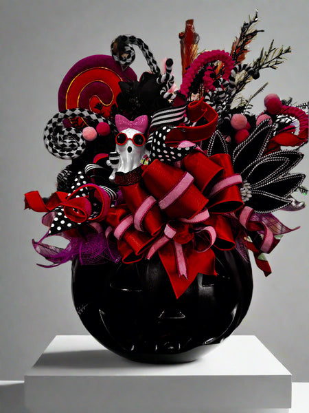 Colorful decorative bow with ribbons on a black background