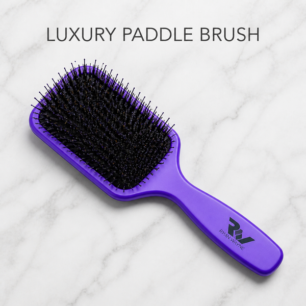 Ryan Wayne Purple Luxury Paddle Brush on white marble