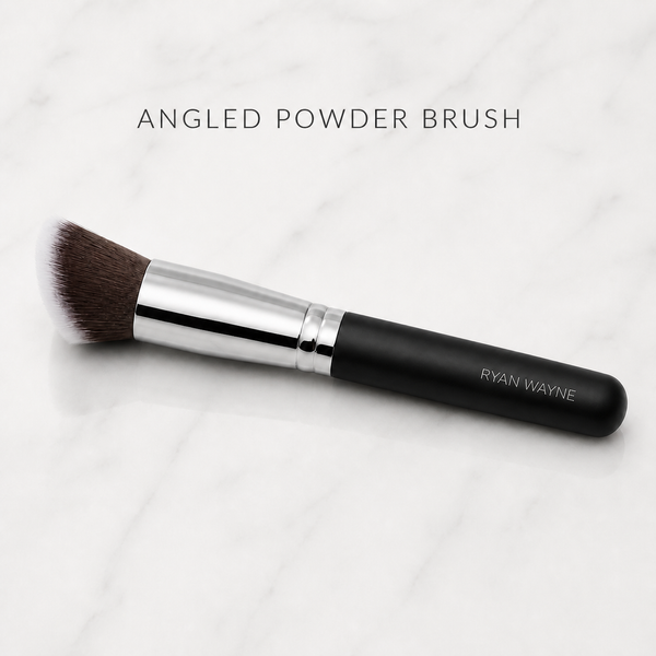 Ryan Wayne Angled Powder Brush on white marble with product label