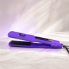 Ryan Wayne purple ceramic flat iron on white marble with soft plum lighting