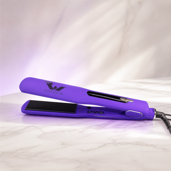 Ryan Wayne purple ceramic flat iron on white marble with soft plum lighting