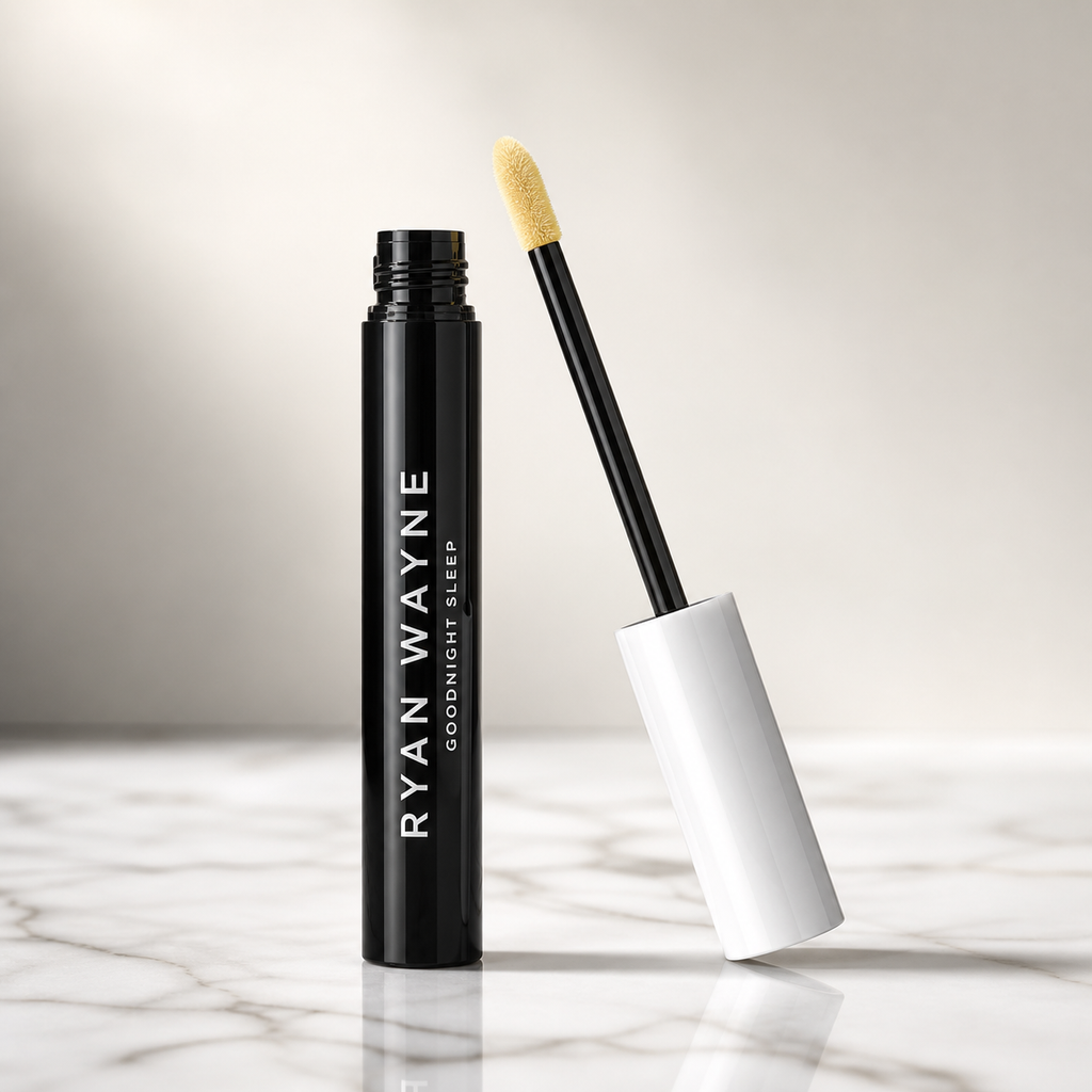 Ryan Wayne Goodnight Sleep Under Eye Color Corrector in black tube with white cap and pale-yellow applicator