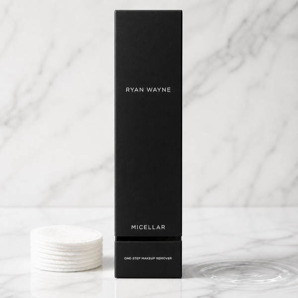 Ryan Wayne Micellar One-Step Makeup Remover in black packaging on white marble