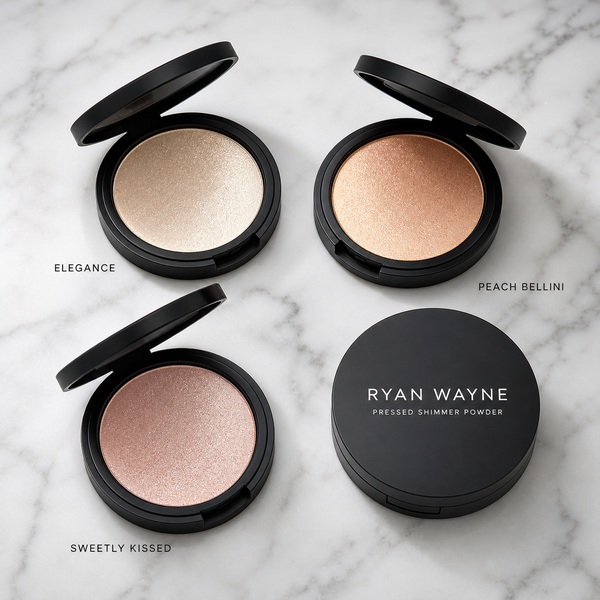 Ryan Wayne Pressed Shimmer Powder three-shade collection on white marble
