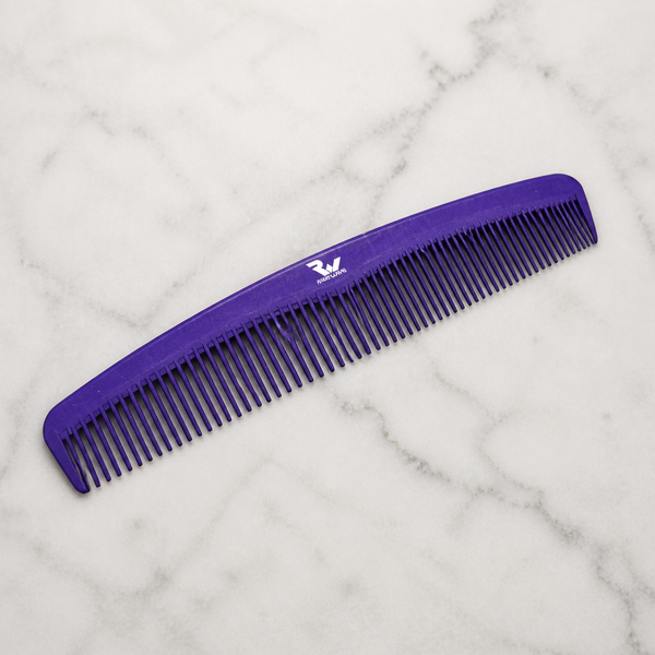 Purple Ryan Wayne professional carbon styling comb on white marble