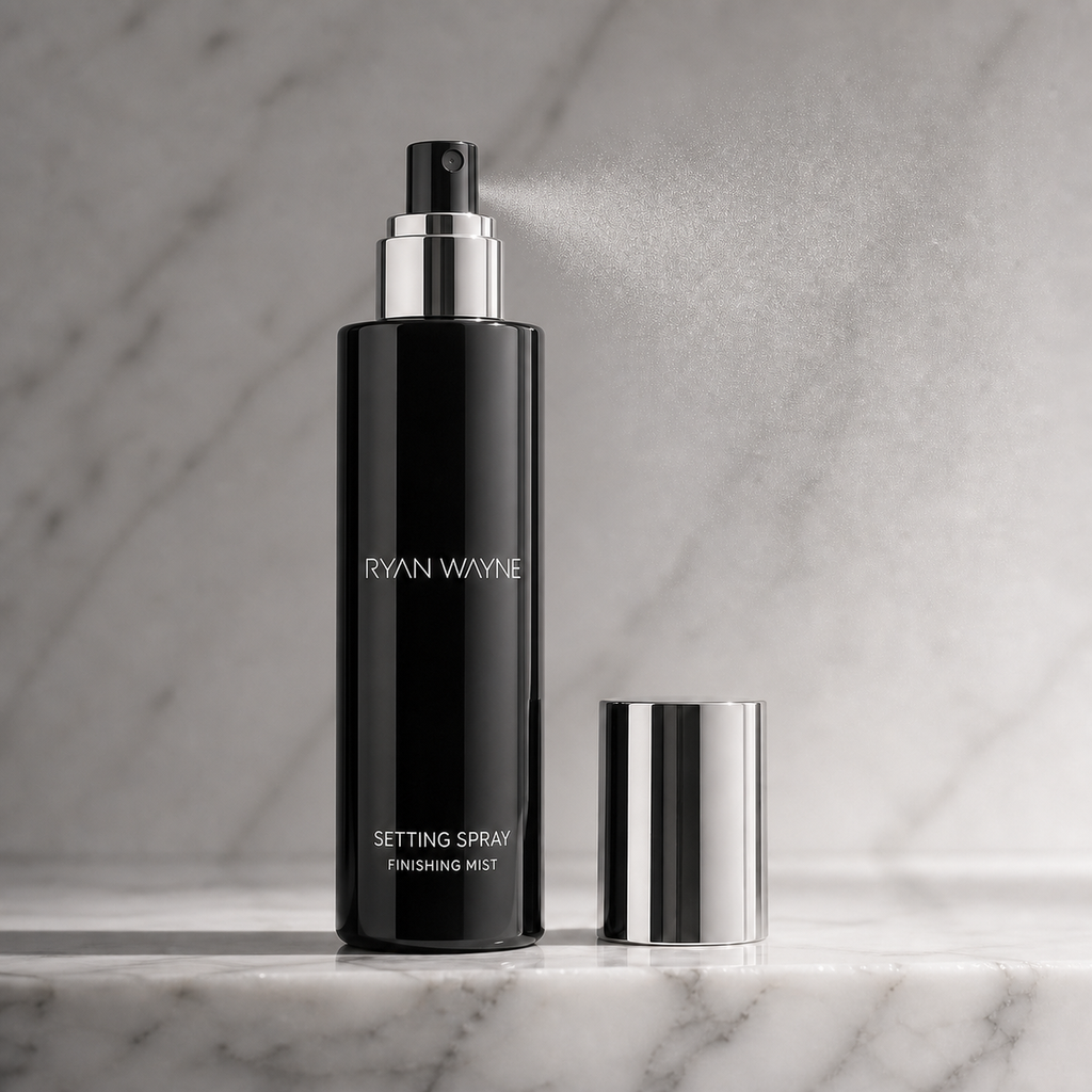 Ryan Wayne Setting Spray tall black bottle with black nozzle and chrome cap