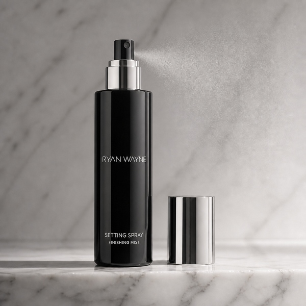 Ryan Wayne Setting Spray tall black bottle with black nozzle and chrome cap