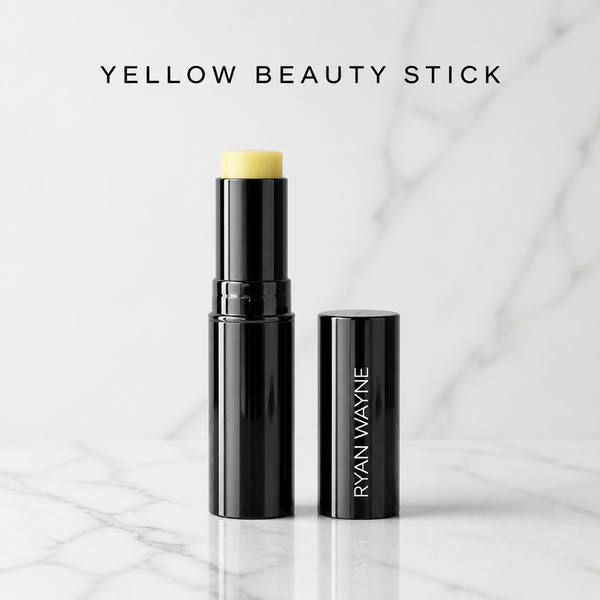 Ryan Wayne Yellow Color-Correcting Beauty Stick on white marble