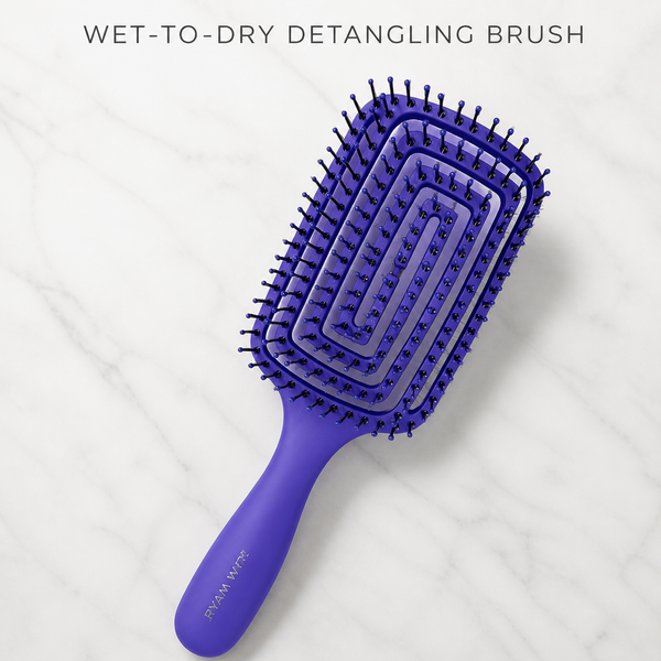 Ryan Wayne Wet-to-Dry Detangling Brush on white marble